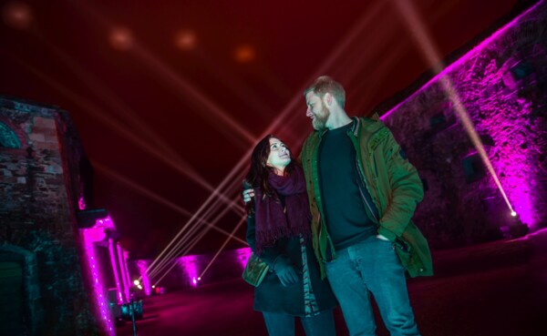 Couple looks one another in the eyes at the Christmas Garden in Ehrenbreitstein Fortress ©Christmas Garden, Artur Lik